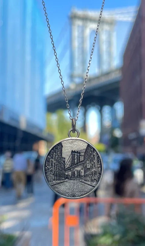 Brooklyn Bridge pendant photographed in Dumbo